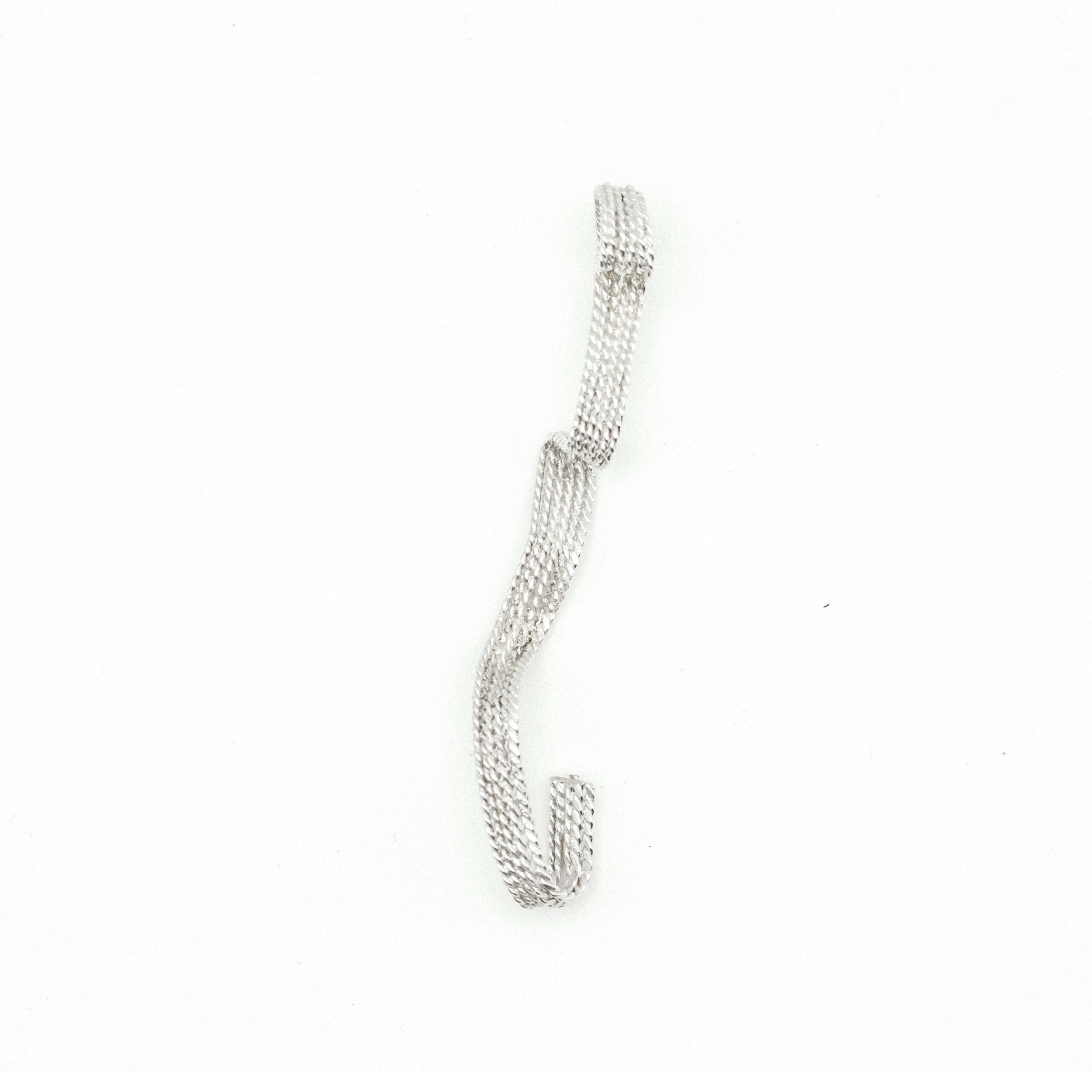 silver-filigree-anatomical-ear-cuff-trickle-above Handmadeˇanatomical filigree ear piece in 999 silver from above